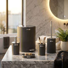 تحميل الصورة في عارض المعرض، Set of gray bathroom accessories including a toilet brush holder, soap dispenser, and trash can on a white background.