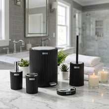 تحميل الصورة في عارض المعرض، Set of black bathroom accessories including a toilet brush holder, soap dispenser, and trash can in a modern bathroom setting.