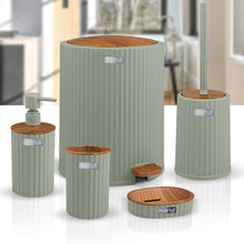 تحميل الصورة في عارض المعرض، Set of cylindrical green planters with wooden bases in front of a building.