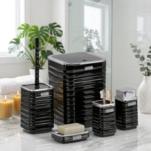 تحميل الصورة في عارض المعرض، Black bathroom accessory set on a white surface with a blurred bathroom background