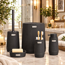 Load image into Gallery viewer, A six-piece bathroom vanity set in dark charcoal gray ribbed ceramic, including a toilet brush holder, brush holder, soap dish, toothbrush holder, cup, and a tall storage jar, displayed in front of a blurred modern bathroom background.