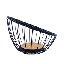 Load image into Gallery viewer, A matte black metal fruit bowl with a round bamboo base designed for storing and displaying fruits.