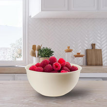 تحميل الصورة في عارض المعرض، Bowl of raspberries on a kitchen counter with a white cabinet and window in the background