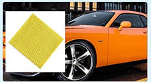 تحميل الصورة في عارض المعرض، Yellow mesh product with an orange car in the background
