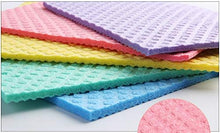 تحميل الصورة في عارض المعرض، Stack of colorful textured cleaning cloths on a white background.