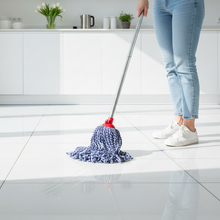 تحميل الصورة في عارض المعرض، A blue and white geometric patterned mop head with a red attachment.