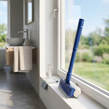 Load image into Gallery viewer, A blue window squeegee with a long handle and a white rubberized blade, shown on a plain white background.