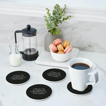 تحميل الصورة في عارض المعرض، Coasters with text on a table with coffee, macarons, and a plant.