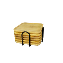 Load image into Gallery viewer, Stack of bamboo coasters with a holder on a woven mat with plants in the background, featuring the El Amine brand.