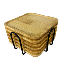 Load image into Gallery viewer, Stack of bamboo coasters with a holder on a textured surface, brand 'El Ameed' visible.