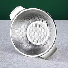 Load image into Gallery viewer, Metal mesh strainer on a gray surface with a green background