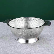Load image into Gallery viewer, Metallic colander on a gray surface with a green background