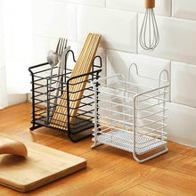 تحميل الصورة في عارض المعرض، Two kitchen utensil racks, one black and one white, on a wooden countertop with a tiled wall background.