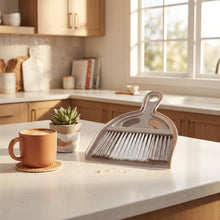 Load image into Gallery viewer, Gray dustpan with bristle brush on a white background