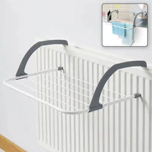 Load image into Gallery viewer, White radiator cover with gray handles on a white background