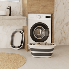 Load image into Gallery viewer, Washing machine in a modern laundry room with a striped laundry basket and buckets.