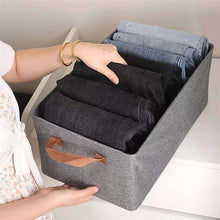 Load image into Gallery viewer, Folded clothes organised inside a grey linen storage box