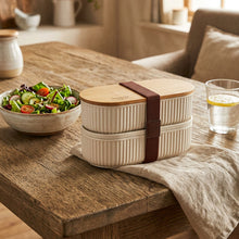 Load image into Gallery viewer, Two-tier ceramic bento box with wooden lid on a kitchen counter