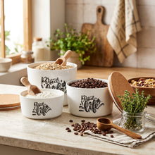 تحميل الصورة في عارض المعرض، Three white ceramic canisters with light brown bamboo lids, featuring the black printed text 'Perfect Life' on the front, displayed on a clean white background.