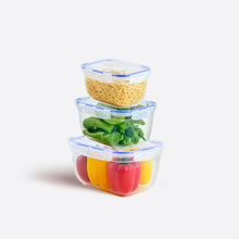 Load image into Gallery viewer, Stack of three clear food storage containers with lids on a white background