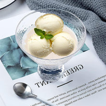 Load image into Gallery viewer, Glass bowl with three scoops of vanilla ice cream on a newspaper
