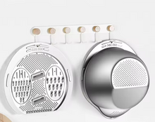 Load image into Gallery viewer, Stainless steel multifunction grater and strainer lids hanging on a wall organizer for kitchen convenience.