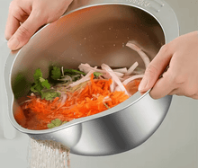 Load image into Gallery viewer, Hands holding a stainless steel multifunction bowl with vegetables, demonstrating easy washing and draining.