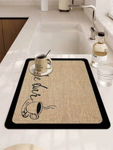 Load image into Gallery viewer, Kitchen mat with coffee-themed design on a kitchen counter