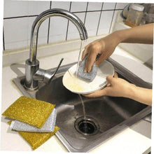 Load image into Gallery viewer, Person using a heavy-duty nylon cleaning sponge at a sink, with multi-purpose scouring pads nearby.