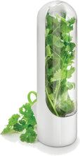 Load image into Gallery viewer, Herb fridge capsule for storing fresh coriander, featuring a clear design to keep vegetables moisture intact.