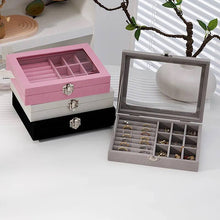 Load image into Gallery viewer, Pink, gray, and black jewelry boxes on a white surface with a blurred background.