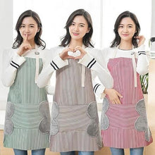 تحميل الصورة في عارض المعرض، Three women wearing aprons and making heart shapes with their hands.
