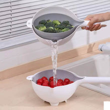 تحميل الصورة في عارض المعرض، Two-tiered colander with broccoli and tomatoes being rinsed over a sink.