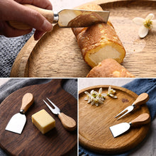 تحميل الصورة في عارض المعرض، Cheese knife set with wooden handles slicing cheese on wooden board, featuring spade and fork knives.