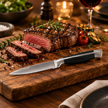 تحميل الصورة في عارض المعرض، Sliced steak with a sharp knife on a white background