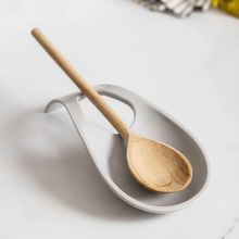 تحميل الصورة في عارض المعرض، Wooden spoon on a white plate with a blurred background