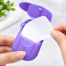تحميل الصورة في عارض المعرض، Purple and white container with a light inside, held by hands against a blurred background.