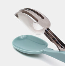 Load image into Gallery viewer, Teal ladle with a silver spoon on a white background