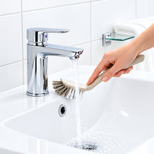 Load image into Gallery viewer, Oval handled brush being used to clean a bathroom sink