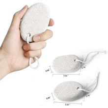 Load image into Gallery viewer, Hand holding a textured stone with measurements displayed on a white background