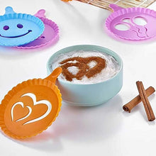Load image into Gallery viewer, Colorful silicone coasters with various designs on a white surface with a glass of hot chocolate and cinnamon sticks.