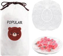 Load image into Gallery viewer, Plastic food storage covers in a bag with a cute bear design, showing covers and a plate of strawberries.