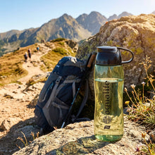 تحميل الصورة في عارض المعرض، Green water bottle with black lid and handle on a white background