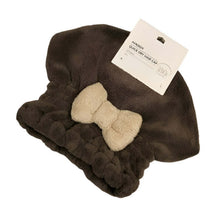 Load image into Gallery viewer, Brown hair cap with a beige bow and a tag on a white background