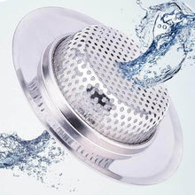 تحميل الصورة في عارض المعرض، Metal strainer with water splashes on a light gray background