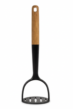 تحميل الصورة في عارض المعرض، Black slotted spoon with a wooden handle on a white background