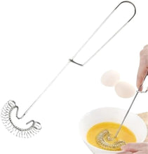 Load image into Gallery viewer, Metal whisk being used to mix eggs in a bowl with a close-up of the whisk's spring mechanism.