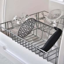 تحميل الصورة في عارض المعرض، Dish rack with utensils and glassware inside a kitchen cabinet.