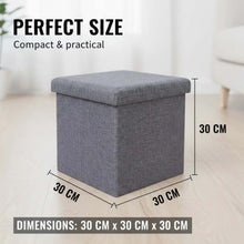 تحميل الصورة في عارض المعرض، Gray storage ottoman with dimensions labeled on a light wooden floor.