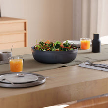 Load image into Gallery viewer, Dining table setting with a bowl of salad and glasses of juice.